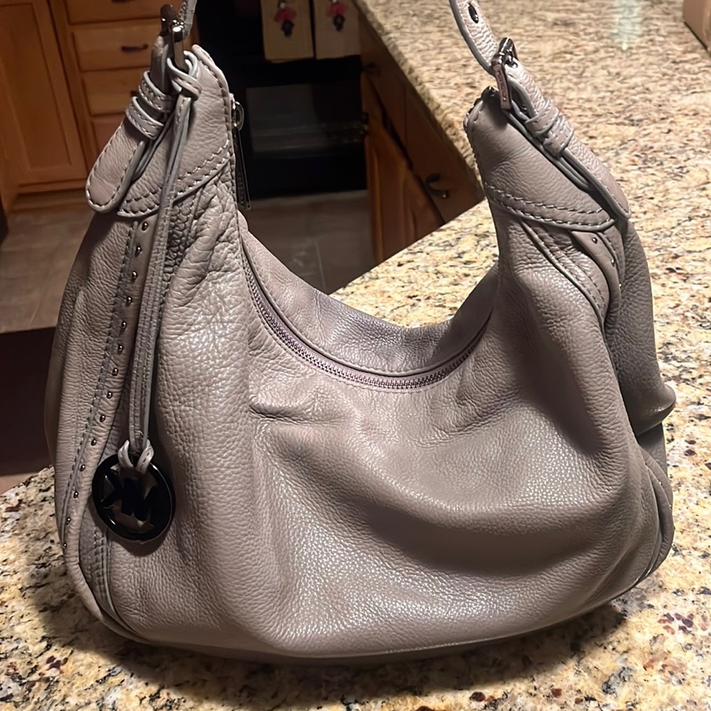 Authentic gray Michael Kors bag. Perfect condition